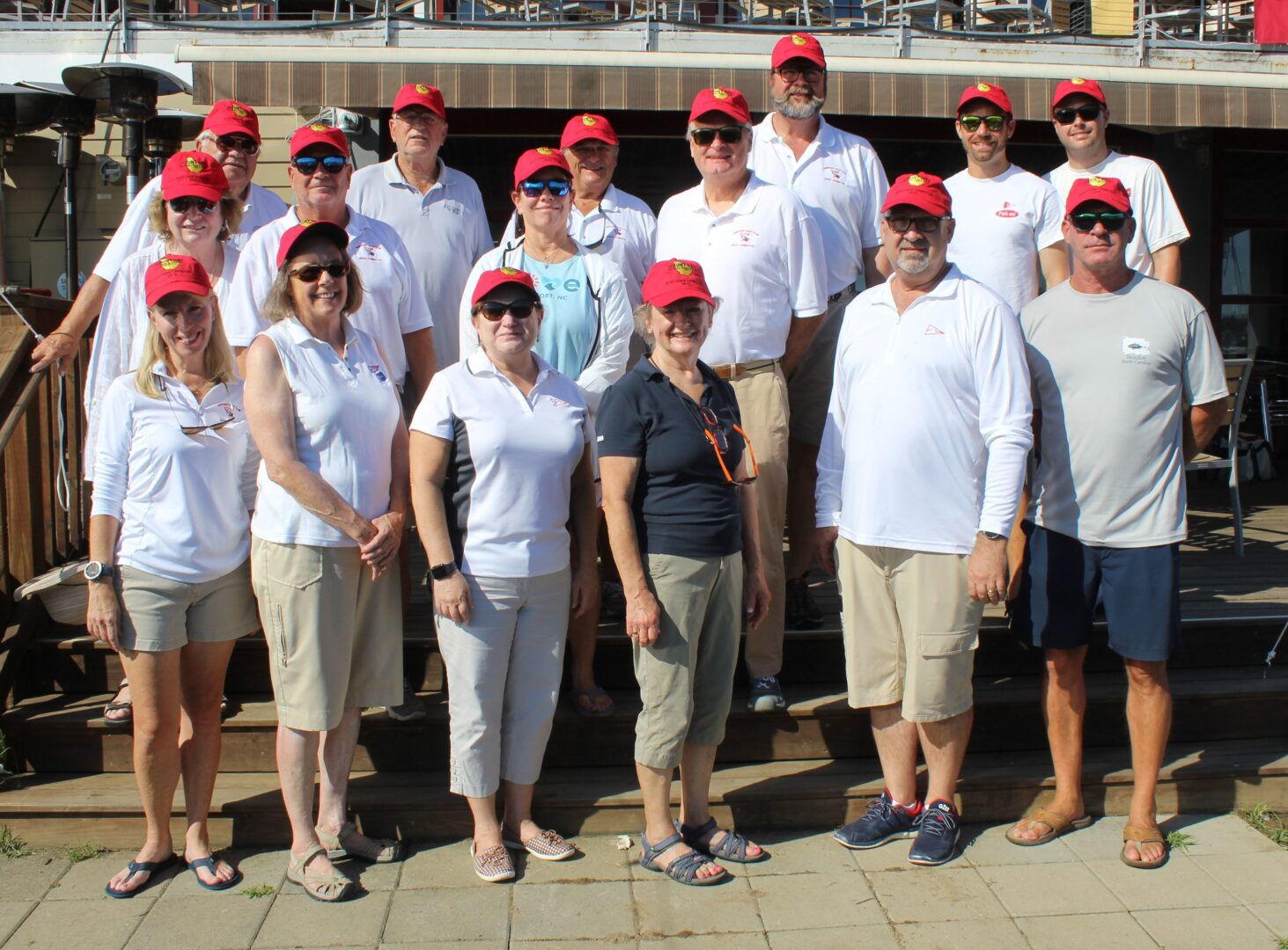 Group photo of CRAB staff and volunteers at Eastport Yacht Club supporting The CRAB Cup regatta. 